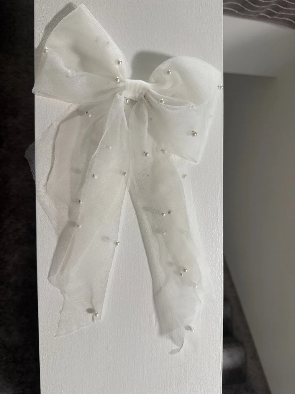 White pearl bow clip